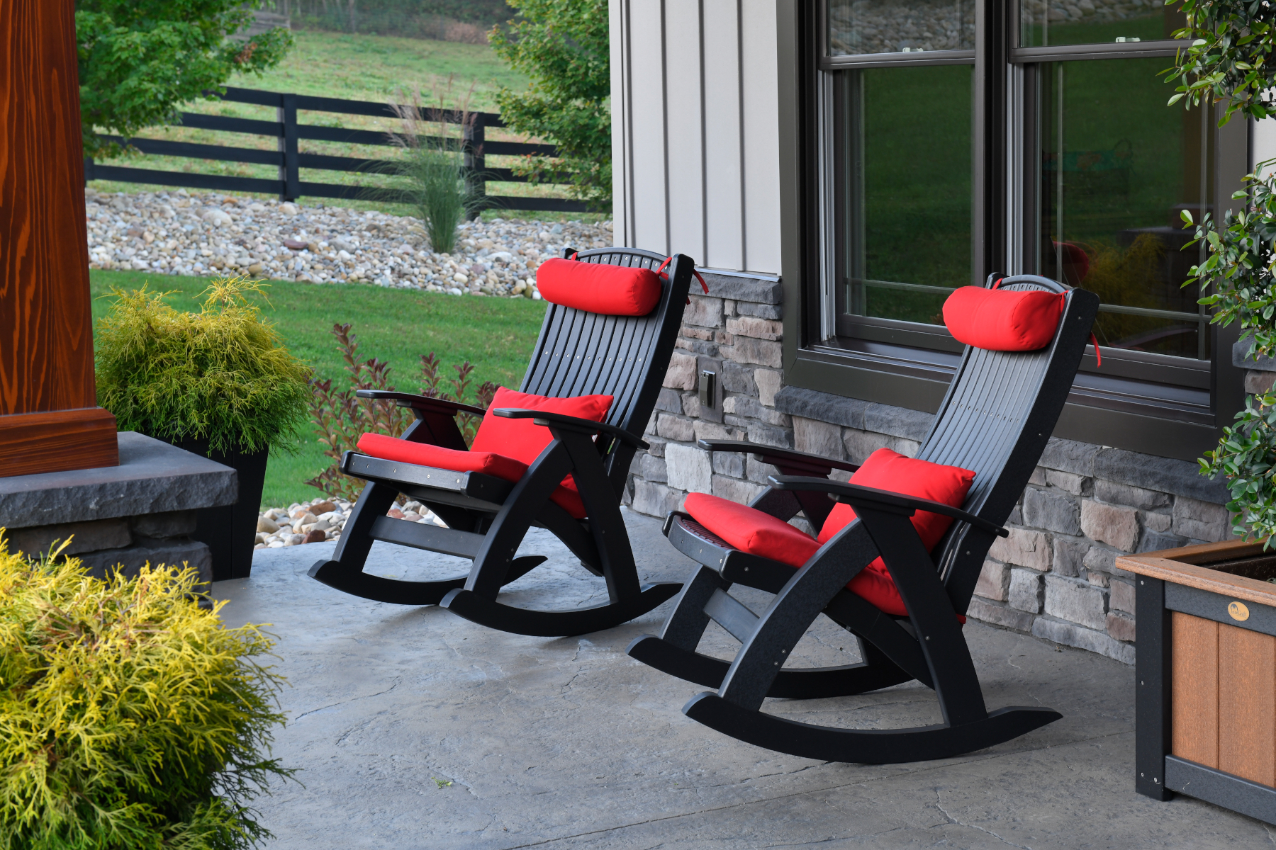 Poly Comfort Rockers in Black with Red Pillows 