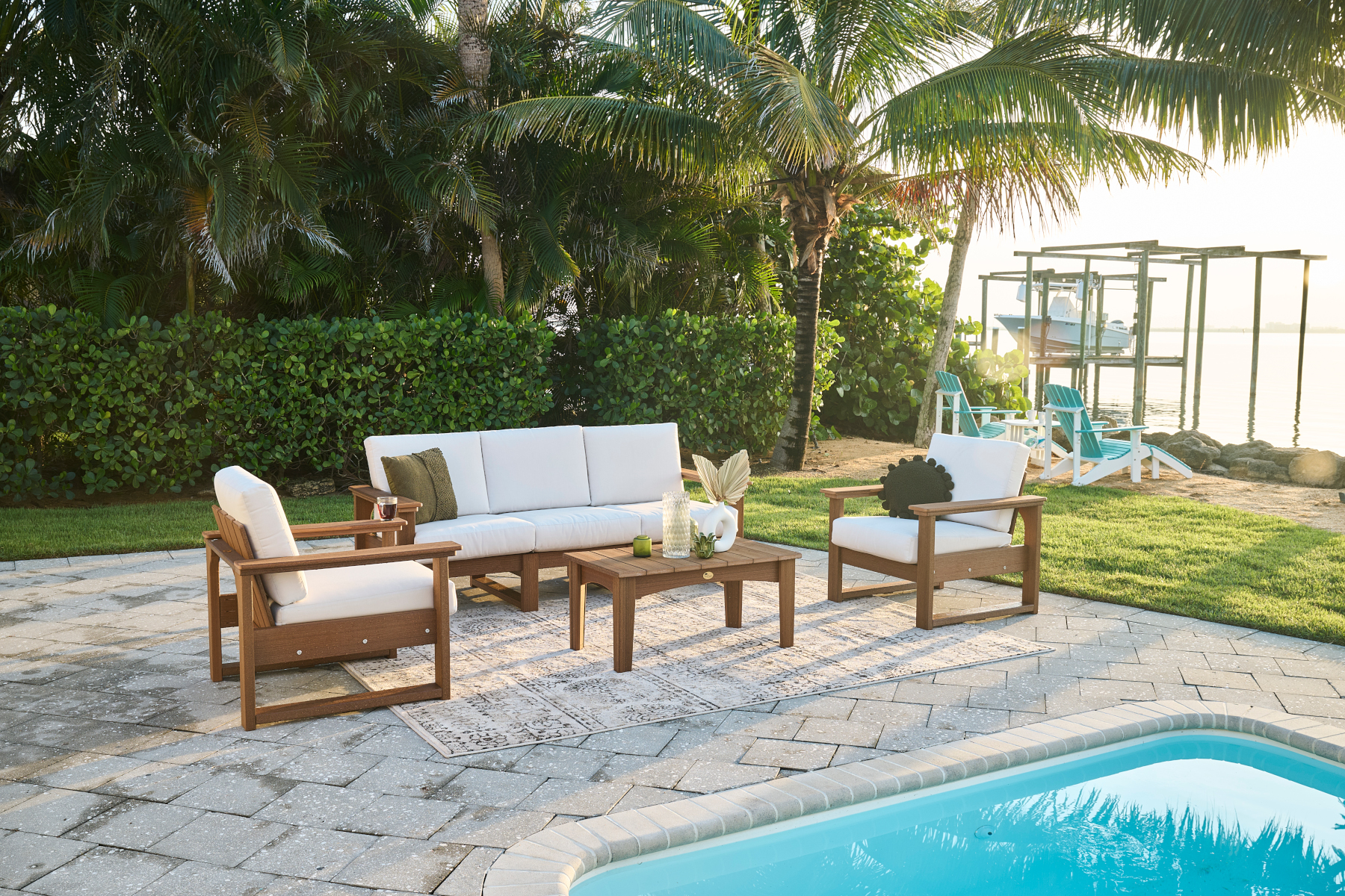 Lanai Deep Seating Chairs and Sofa in Antique Mahogany with Canvas Fabric.