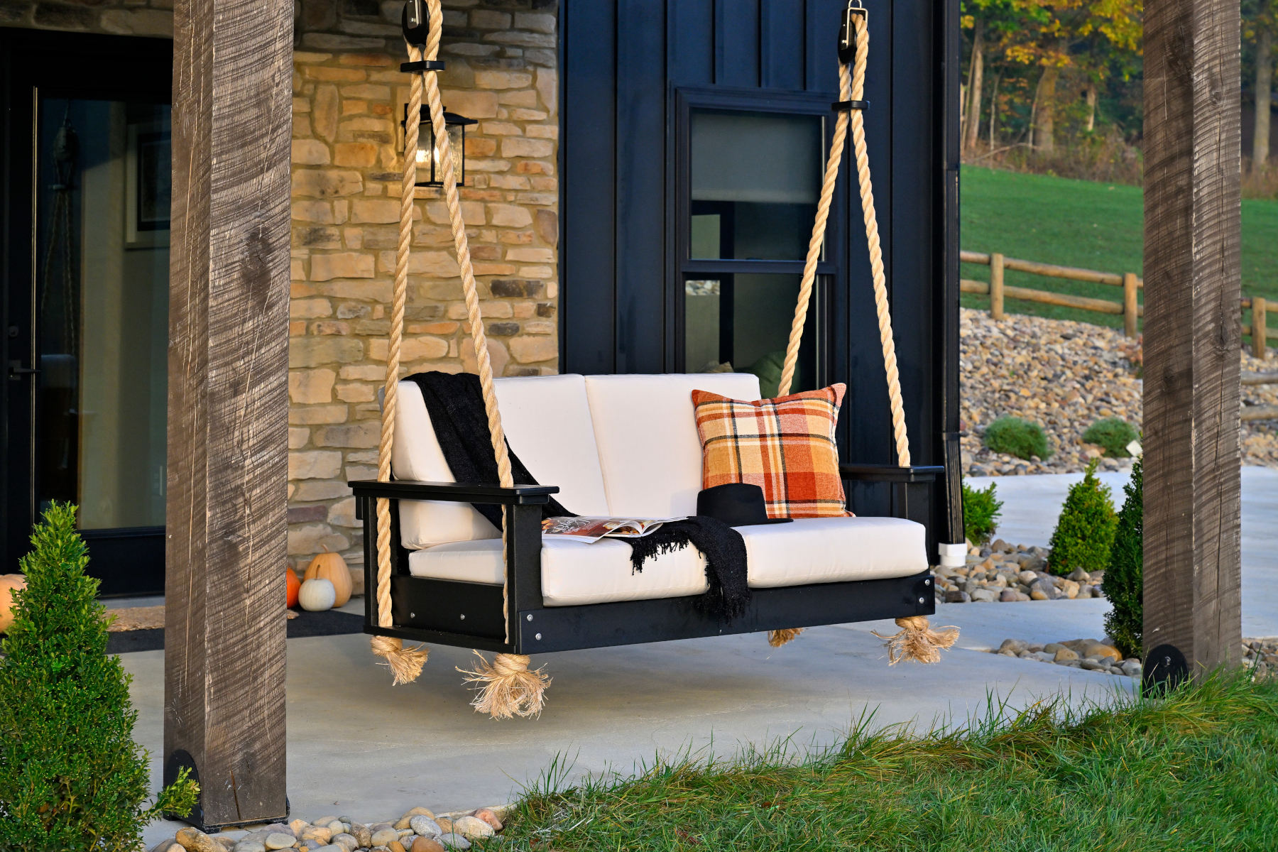Lanai Deep Seating Swing in Black with Canvas Fabric.
