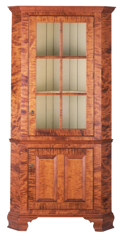 Alexandria Corner Cupboard in Tiger Maple with an Old Maple Finish with Brass Hardware, Ogee Feet and Painted Interior Top