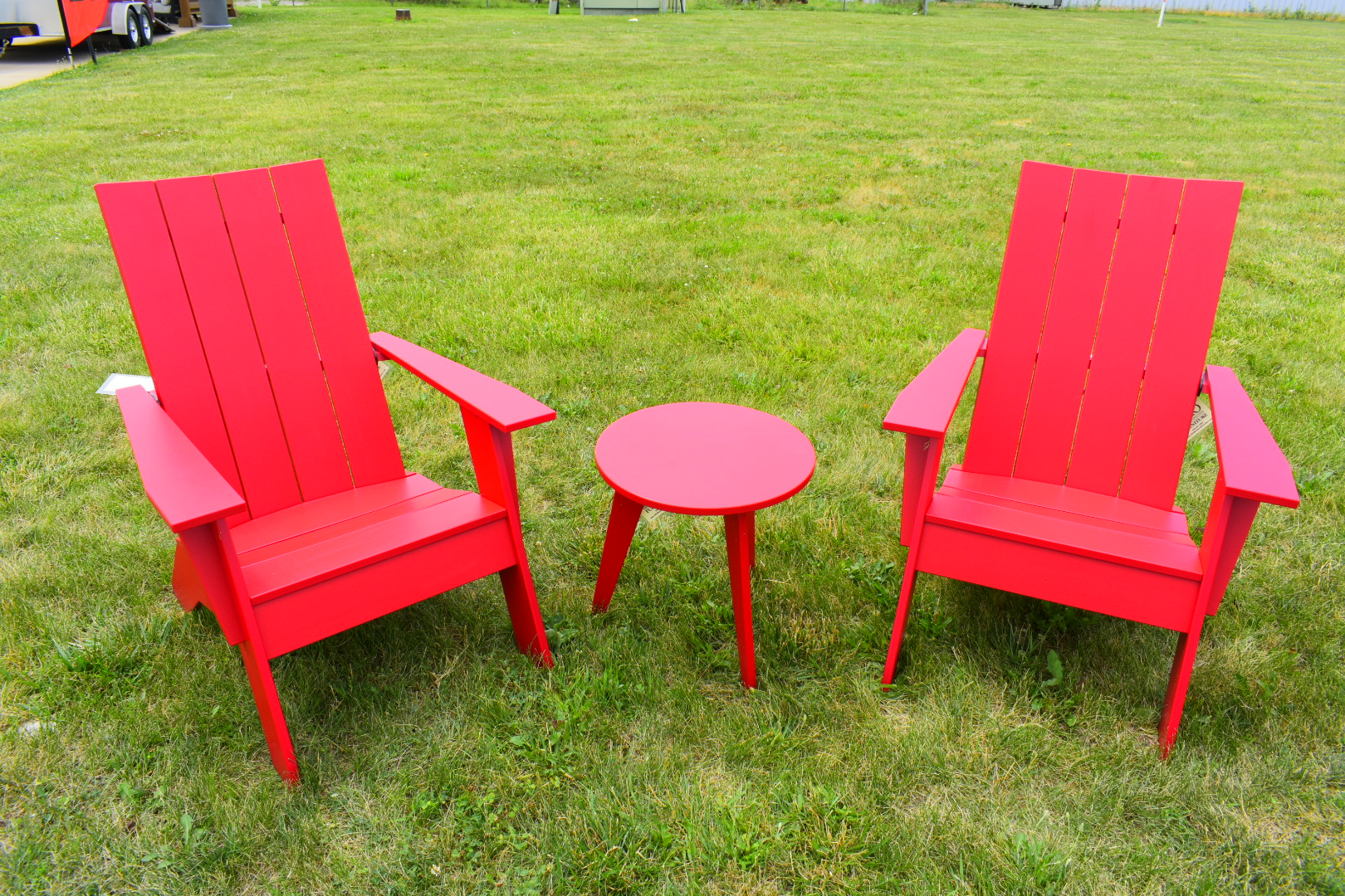 (2) Nordic Adirondack Chairs and (1) Nordic Round End Table in Scarlet Red