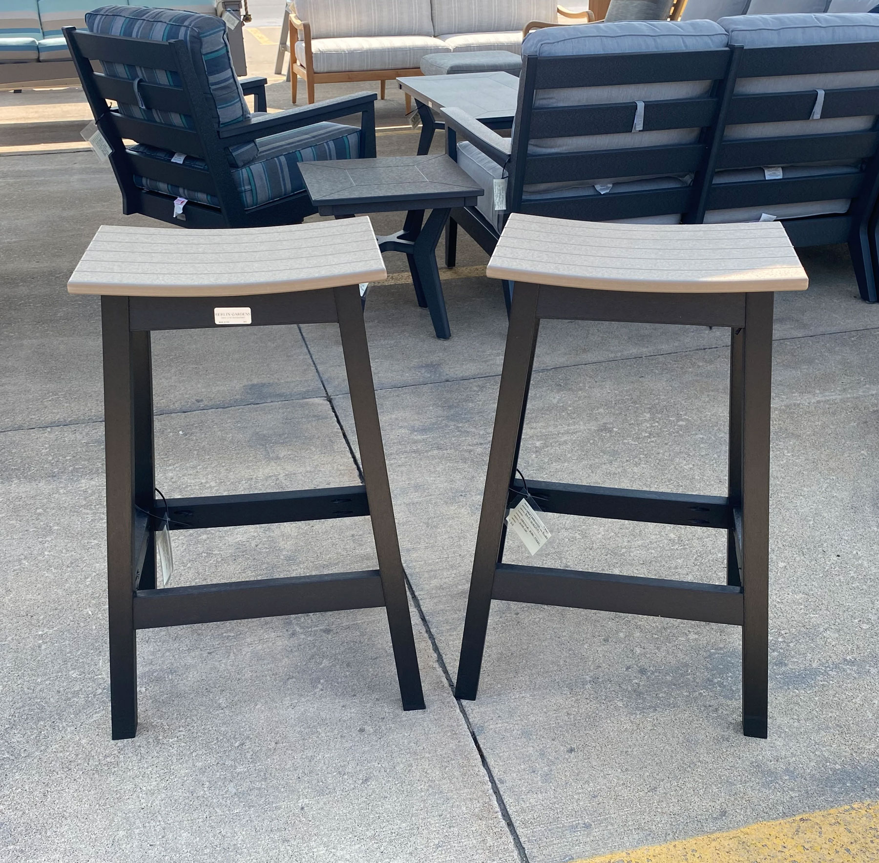 (2) Outdoor Saddle Stools in Weatherwood on Black