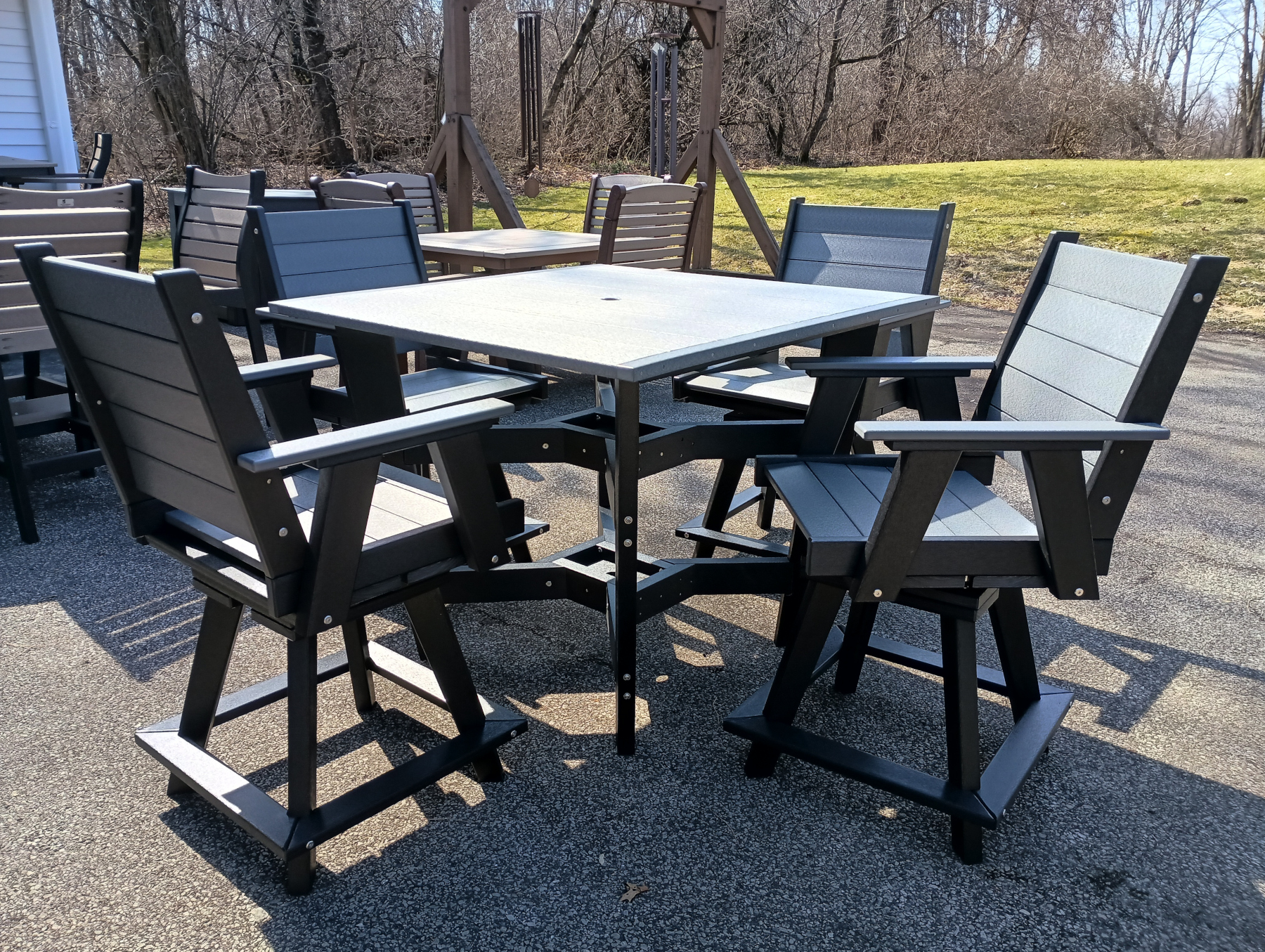 Eclipse 44 x 44 Counter Height Poly Table & (4) Shadow Swivel Counter Chairs
