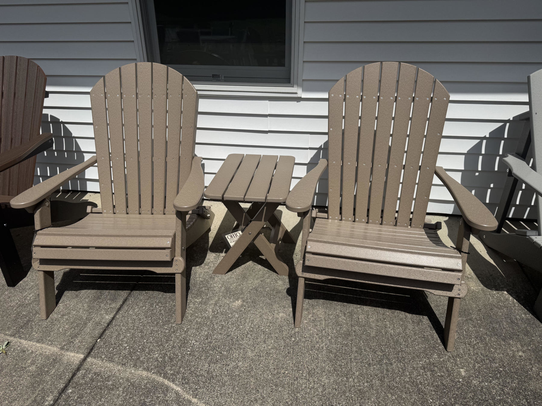 (2) Folding Adirondacks and (1) Folding End Table in Weatherwood