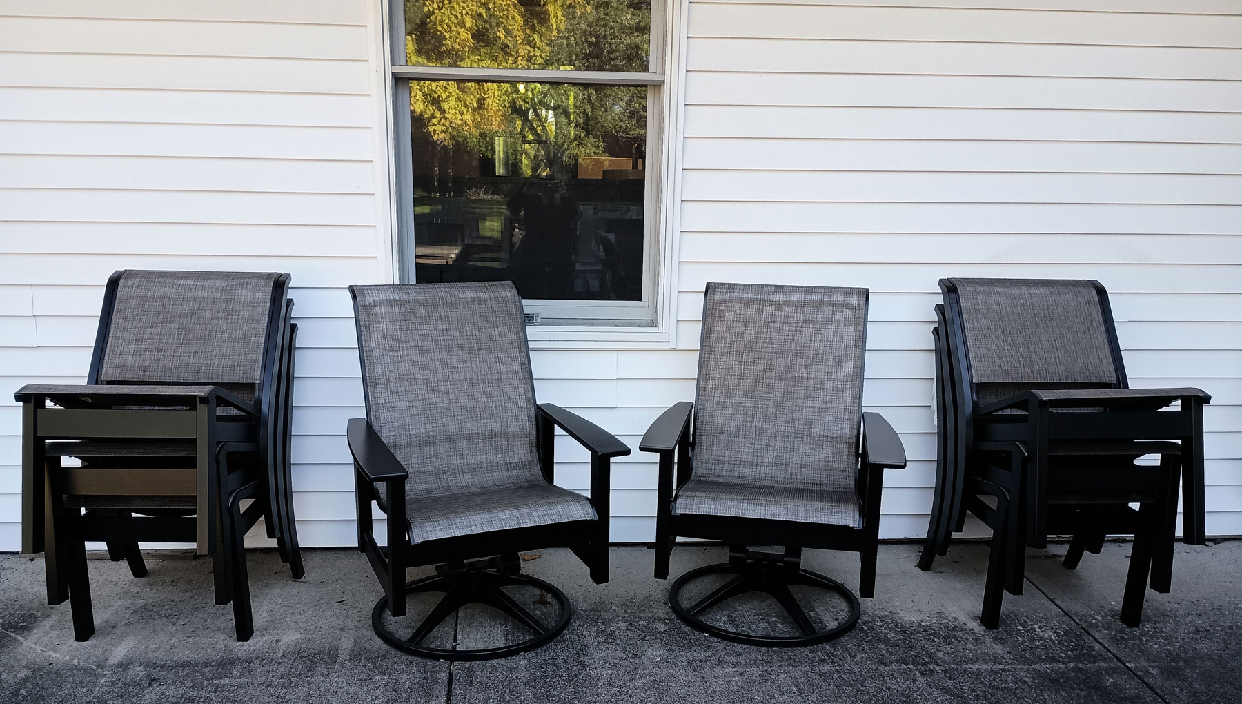 (2) Telescope Casual Leeward Swivel Rockers and (10) Leeward Sling Stacking Chairs