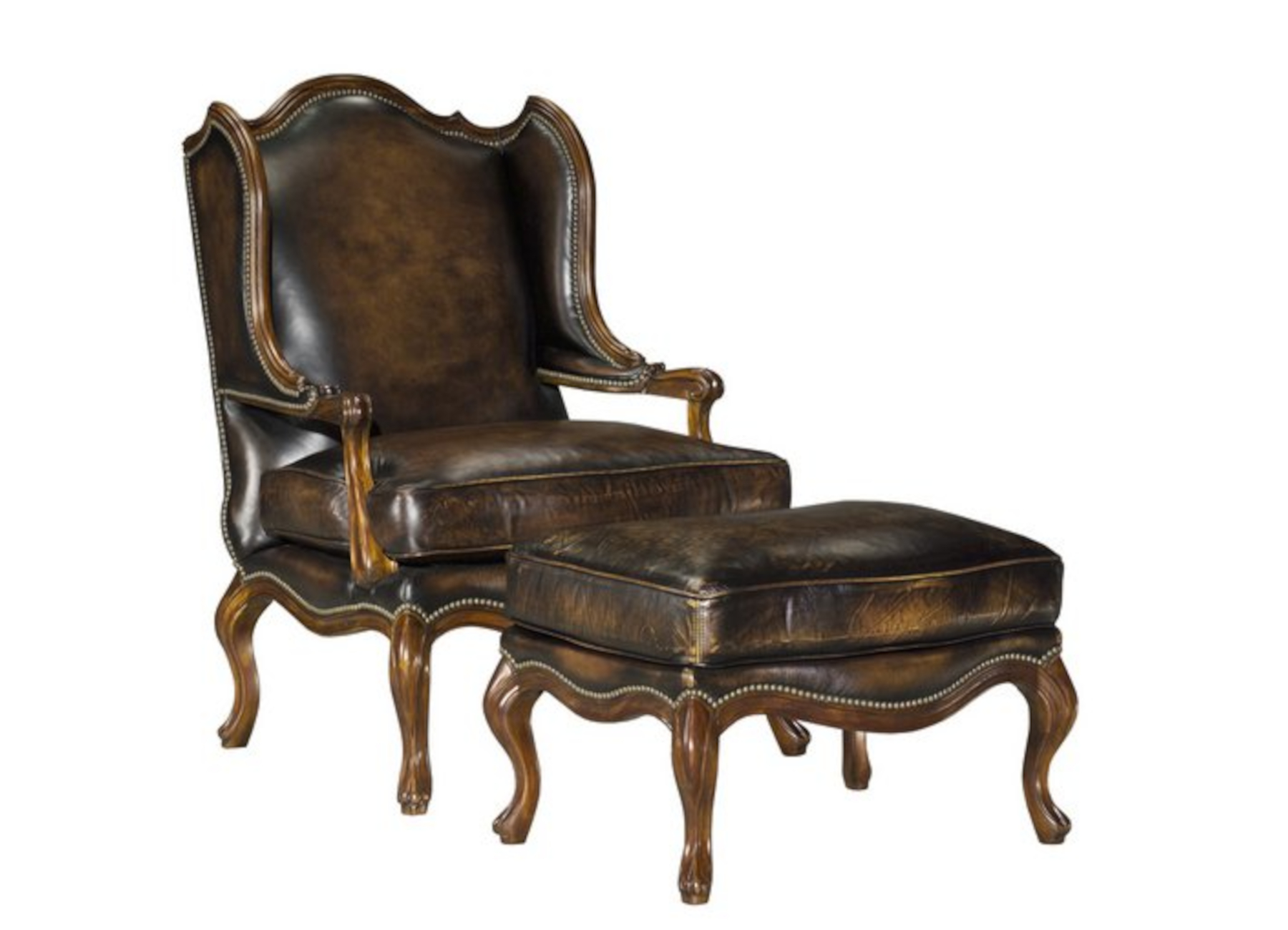 Haute Garrone Wood Carved Wing Chair & Ottoman by Leathercraft (sold separately)